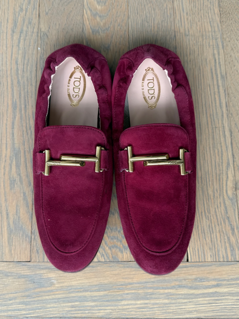 Tod's Burgundy Suede Loafers with Gold Hardware